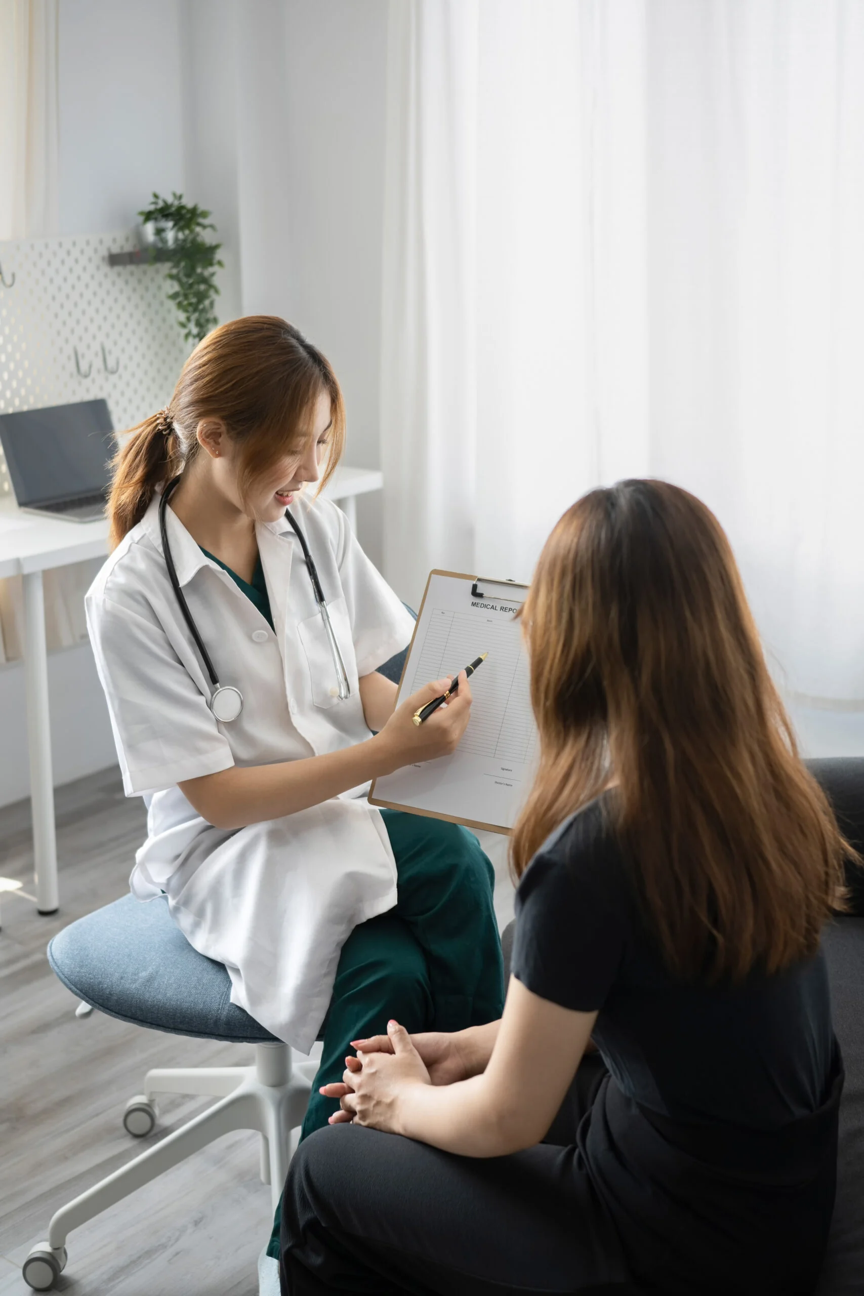 A doctor explaining a diagnosis to a patient