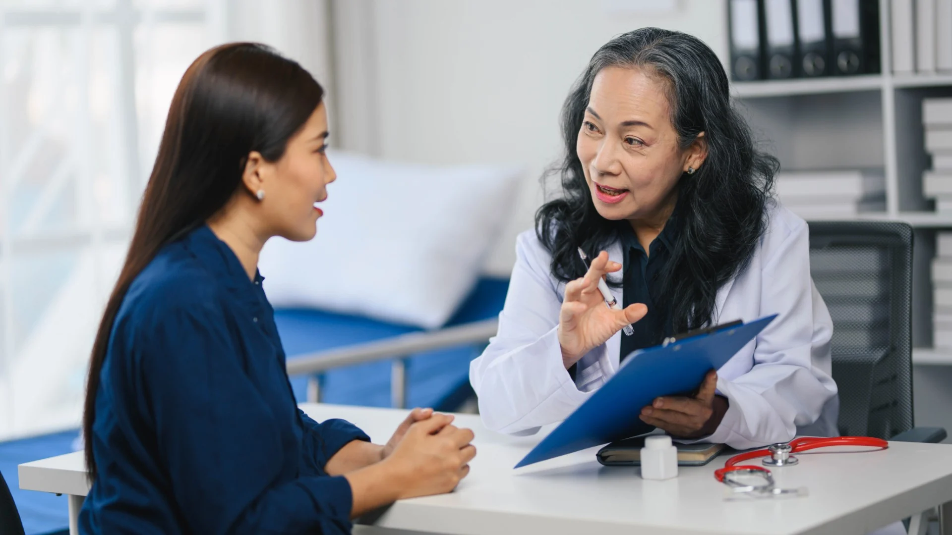 A patient in consultation with a doctor at Granite Belt Medical Services