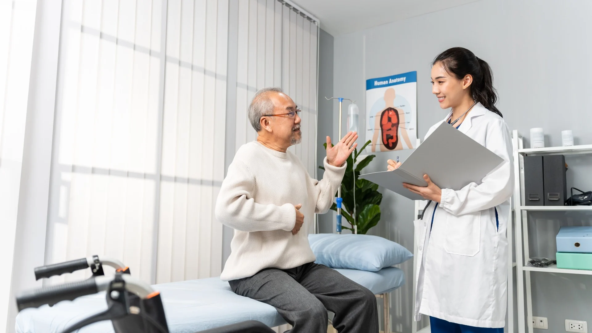 A doctor talking with an older patient